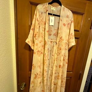 Beautiful flowing Boho Dress by Mia, Joy. Can be worn so many different ways.